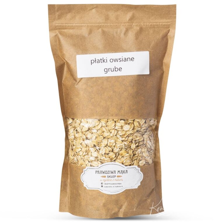 Opakowanie grubych płatków owsianych w brązowej torbie papierowej z etykietą informacyjną.