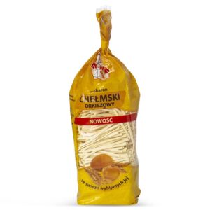 Opakowanie makaronu orkiszowego Chełmski w żółtym woreczku, z napisem Nowość i grafiką świeżych jaj.