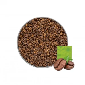 Miska z ziarnami kawy z ilustracją dwóch ziaren i zielonym elementem graficznym w prawym dolnym rogu.