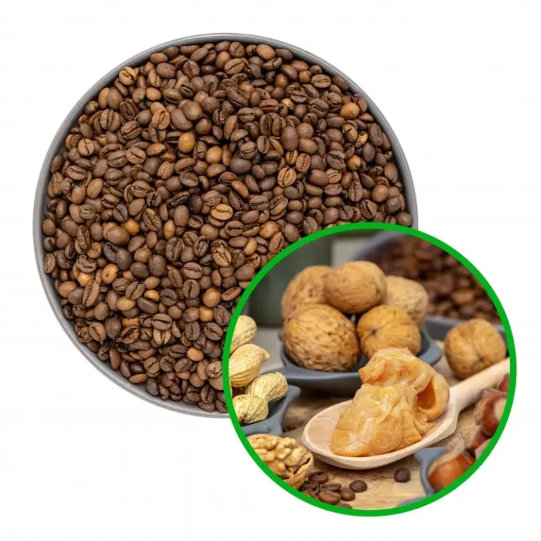 Miska ziaren kawy z nałożoną grafiką orzechów i masła orzechowego na drewnianej łyżce.