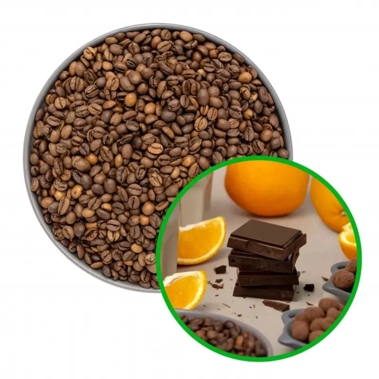 Ziarna kawy w misce z czekoladą, pomarańczami i ciemną tabliczką czekolady na tle.