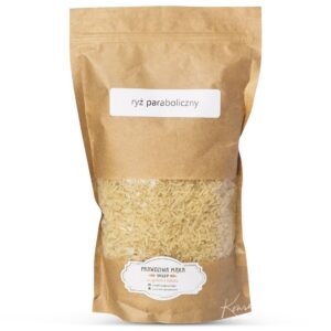 Opakowanie ryżu parabolicznego w brązowym, przezroczystym worku z etykietą, widoczne z przodu.