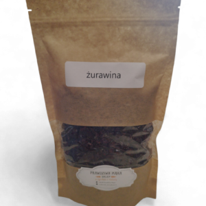 Opakowanie suszonej żurawiny w brązowej torebce z przezroczystym okienkiem i białą etykietą.