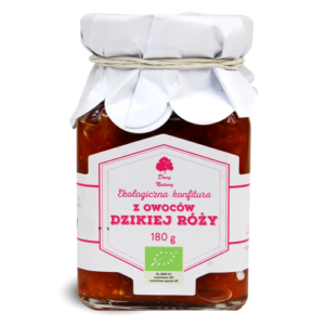 Słoik ekologicznej konfitury z owoców dzikiej róży, 180 g, z etykietą i ozdobnym papierowym wieczkiem.