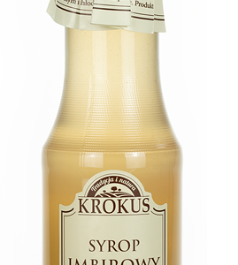 Szklana butelka syropu imbirowego Krokus z białą etykietą i zakrętką, widziana z przodu.