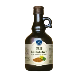 Butelka oleju rzepakowego tłoczonego na zimno, bogatego w Omega-3, etykieta na ciemnej butelce.