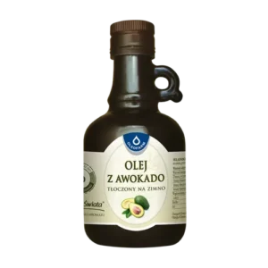 Mała butelka oleju z awokado tłoczonego na zimno. Zielony owoc awokado na etykiecie.