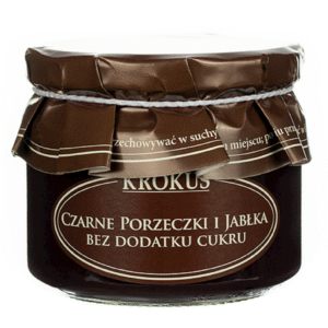 Słoik konfitury Czarne Porzeczki i Jabłka bez cukru, w ciemnym papierowym opakowaniu z napisem Krokus.