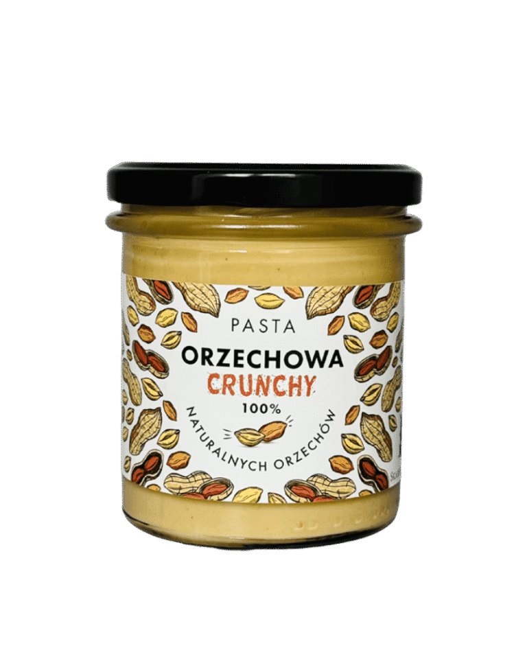 Słoik pasty orzechowej crunchy, 100% naturalnych orzechów, z dekoracyjną etykietą pełną orzechów.