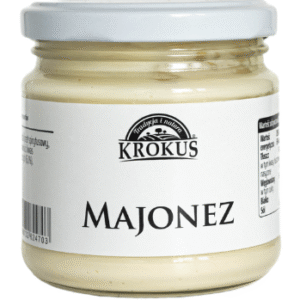 Słoik majonezu marki Krokus z białą etykietą i szarą plastikową zakrętką.