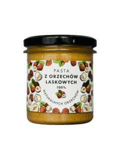 Słoik z pastą z orzechów laskowych, 100% naturalnych. Kremowa konsystencja, etykieta z grafiką orzechów.